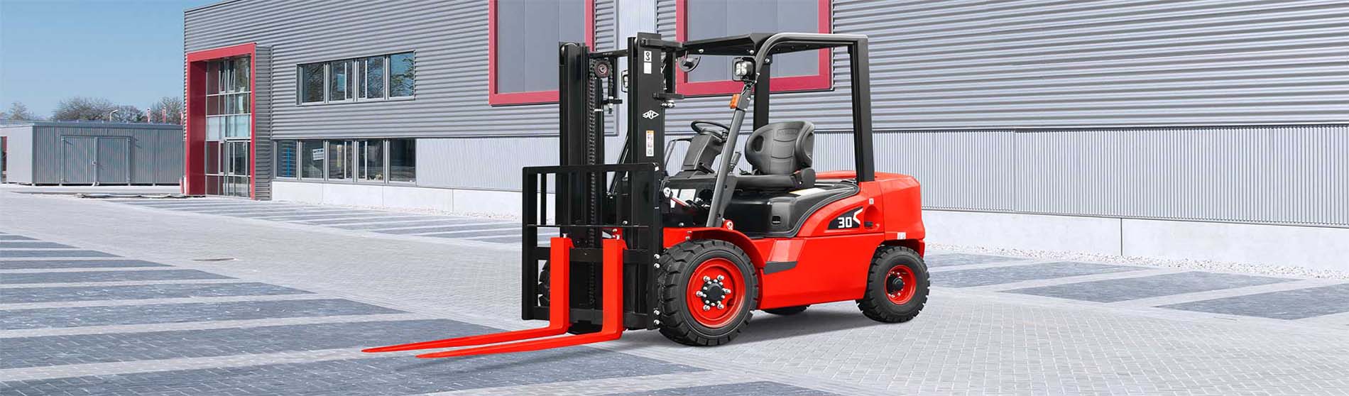 Forklift hire in Borehamwood unloading heavy pallets from a commercial truck